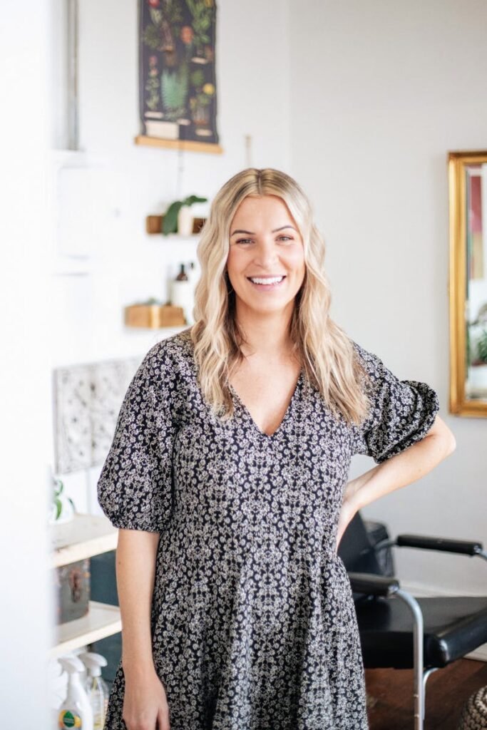 pexels-photo-33867516-33867516 Female entrepreneur in a North Carolina salon, showcasing professional hairstyle and welcoming environment.